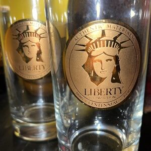 2 - 1986 Authentic Materials Liberty glasses -6.25” tall